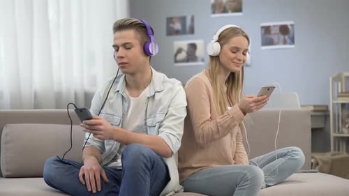 Teens Enjoying Music on Headphones, Mobile Phones