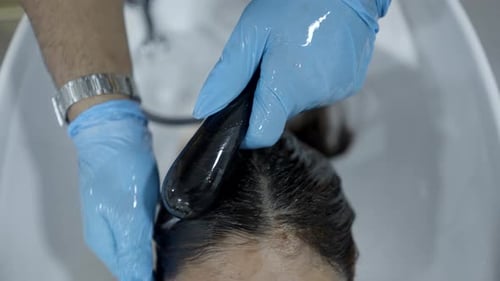Hair Dye Application in Salon Washing Basin