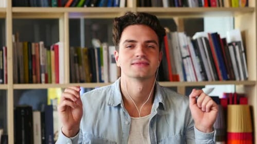 Young Man Dancing Happily at Home