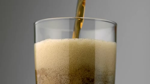 Bubbles Forming in Glass of Refreshing Drink