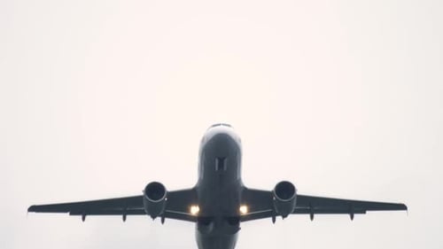 Commercial Airliner Flying Directly Overhead