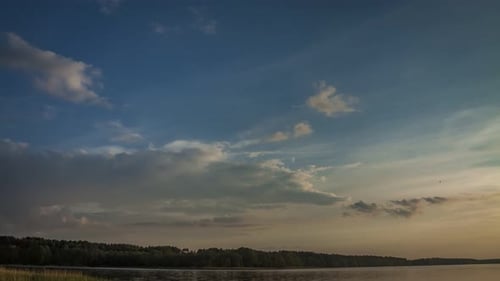 Stunning sunset over the lake in summer, timelapse, 4K