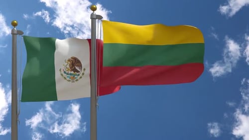 Mexico and Lithuania Flags Waving in Blue Sky