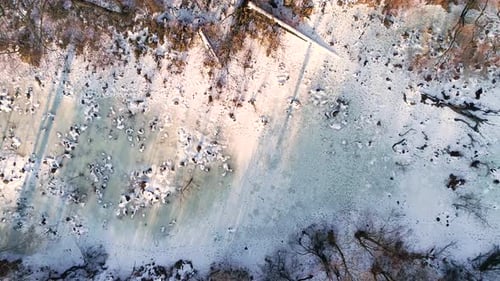 Winter Wonderland: Frozen River Aerial View