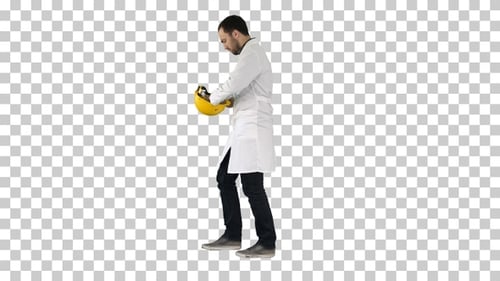Young construction engineering student walking and putting