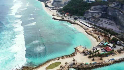 Aerial view panorama of perfect seashore beach adventure by blue ocean with white sandy background o