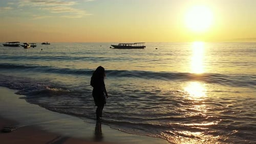Sexy Happy Lady on Photoshoot Having Fun at The Beach on Sunny Blue and White Sand