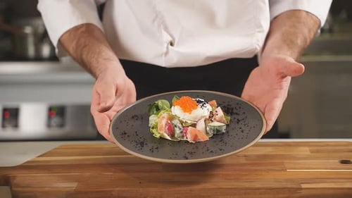 Chef Presents a Fresh Salad Dish