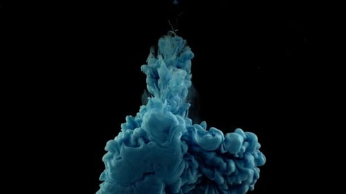 Cyan Ink Flowing in Water on Black Background