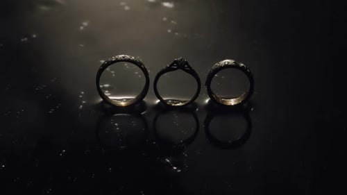 Close Up of Wedding Rings in the Rain