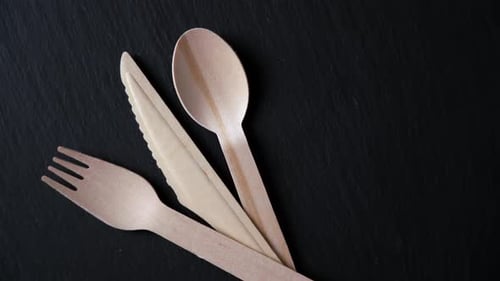 Wooden Cutlery on Black Surface