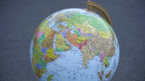 Rotating Earth Globe On The Background.