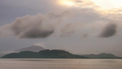 Sunrise morning with ray island Pulau Aman with background Bukit Mertajam Hill