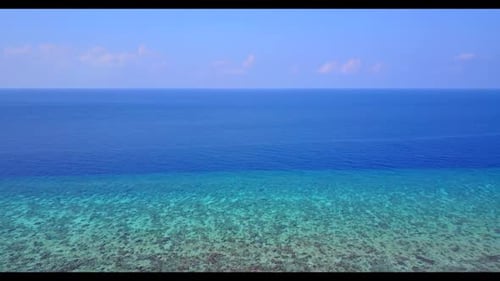 Aerial drone shot texture of marine shore beach adventure by blue green sea and white sand backgroun