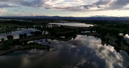 Subtle light changes and reflections in this blissful drone shot of a Colorado Rocky Mountain Sunset