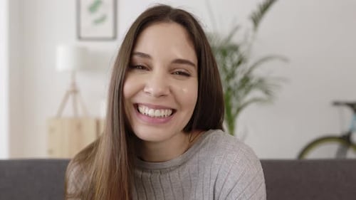 Happy Woman Smiling Looking at Camera