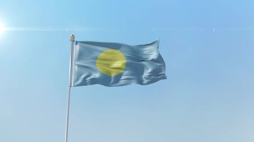Palau Flag Waving in Clear Blue Sky
