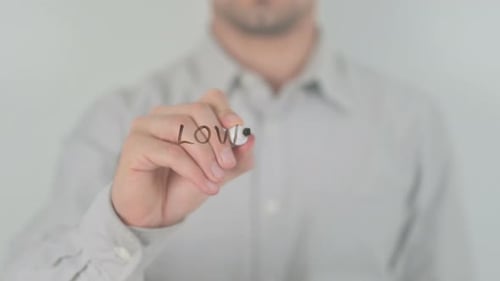 Hand Writes Low Down Payment on Glass