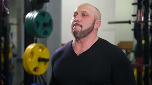 Bodybuilder Lifts Two Heavy Dumbbells Slow Mo