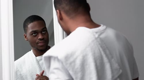Man Skincare Acne Treatment African Touching Face