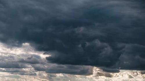Dark Storm Clouds Time-Lapse over Sunlight