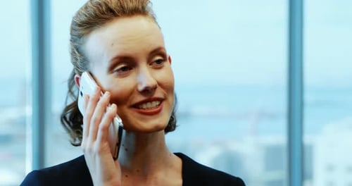 Businesswoman talking on mobile phone