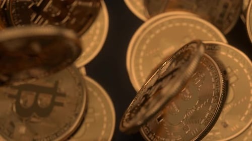 Falling Golden Bitcoin Coins Accumulating Background Animation