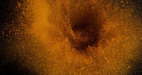 Turmeric, curcuma longa, Powder Exploding against Black Background, Indian Spice, Slow Motion 4K