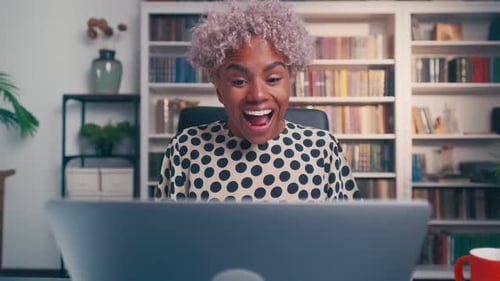 Happy Woman Having Fun in Office Feeling Euphoric and Celebrating Success