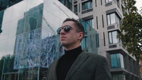 Stylish Man Posing Confidently in City