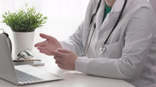 Doctor Gesturing During Online Medical Consultation