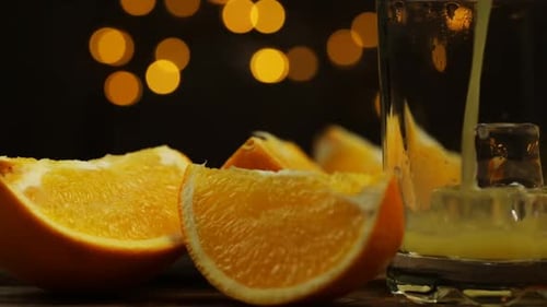 Orange Slices and Juice Close Up