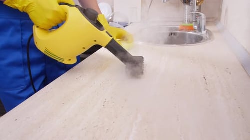Cleaning Kitchen Counter With Handheld Steam Cleaner