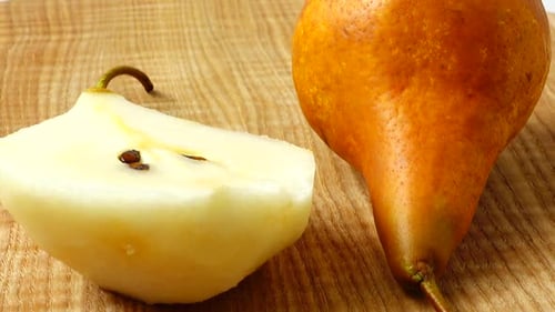 Ripe Orange Pear, One Half Sliced, Close Up