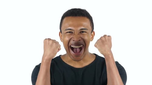 Excited Young Adult Man Celebrates Success