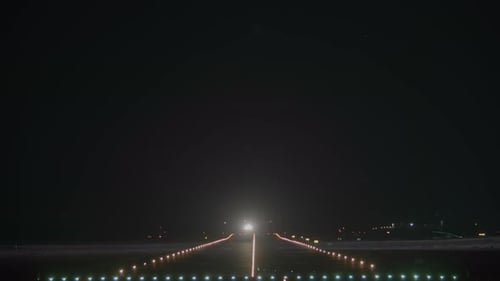 Airplane in the Night Sky