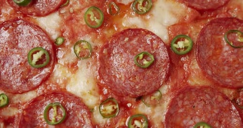 Close up of Pepperoni Pizza with Green Peppers