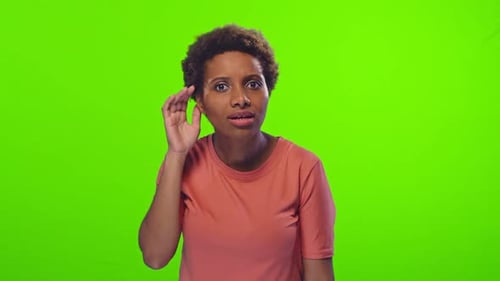 Young African American Woman Laugh After Hears Joke or Anecdote Stands in Studio