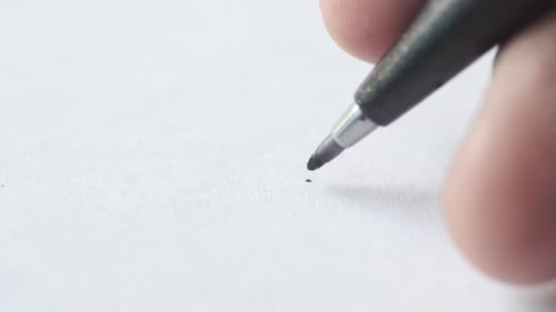 Marker Pen Creates Abstract Mark on White Paper