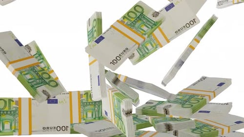 Many wads of money falling on table. 100 Euro banknotes.