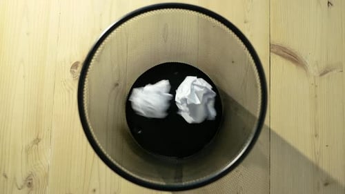 Throw crumpled into the trash.