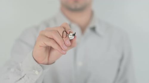 Close Up of Writing Debt Management on Glass