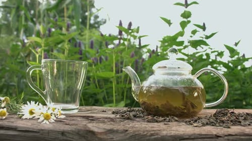 Elegant Teapot Brewing on Rustic Wooden Table Outdoors