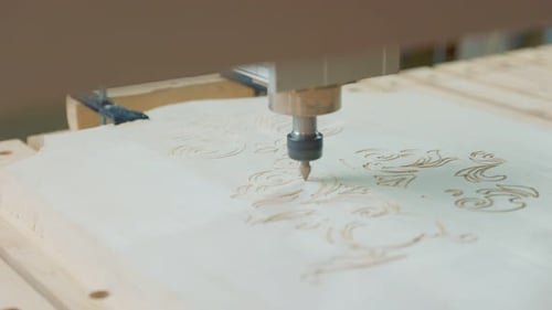 Cutting a Pattern De Wood Blank Using a Machine