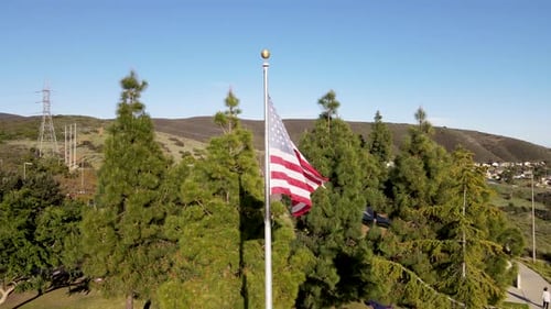 American Flag Waving Proudly in a Sunny Park