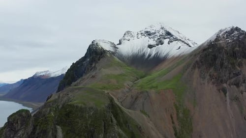 Drone Over Stream And Mountain Peak Of Vestrahorn Mountain