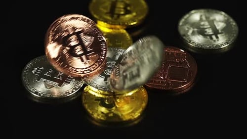 Falling Bitcoin Cryptocurrency Coins in Macro Detail