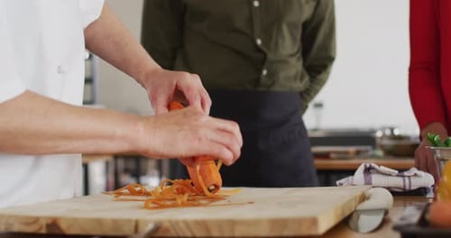 Chef Peeling a Carrot