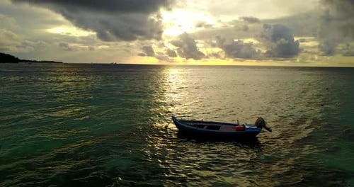 Wide above tourism shot of a white sand paradise beach and blue water background