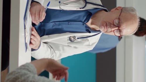 Doctor Consults with Patient in Medical Office